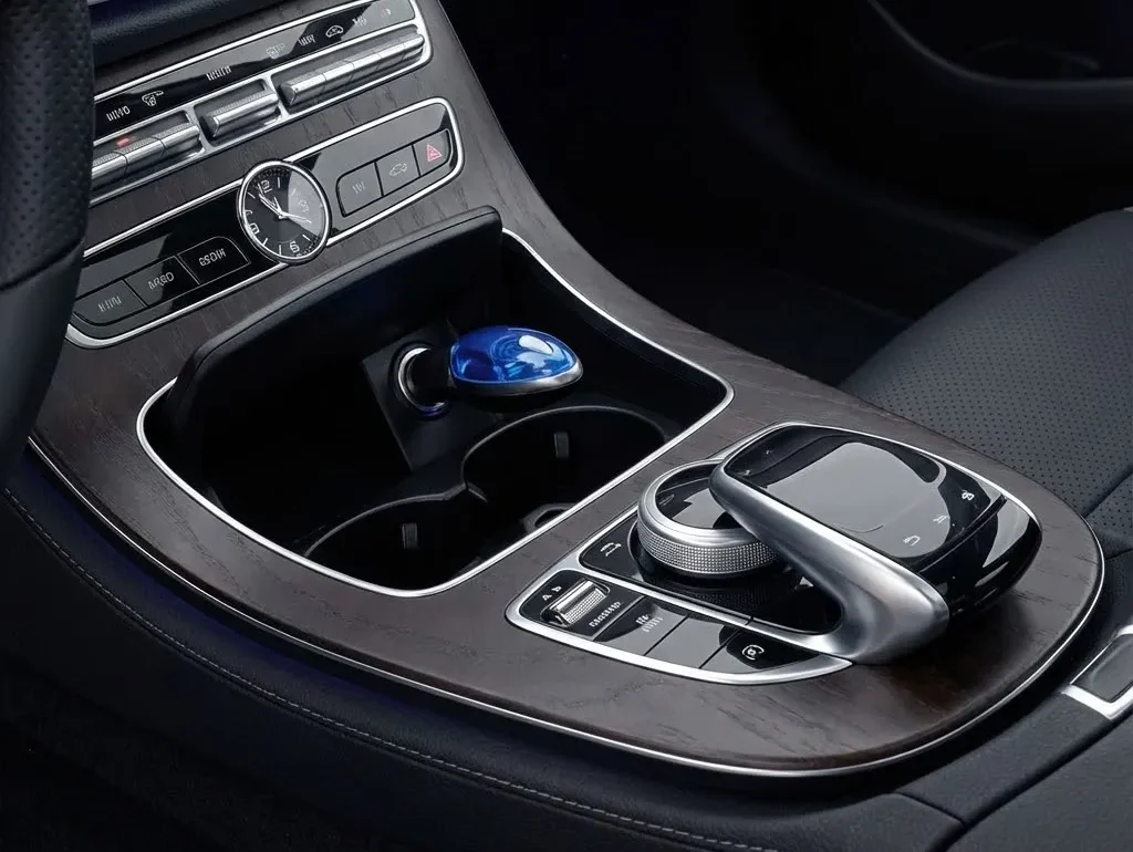 The small and discreet FuelSync device held in hand.